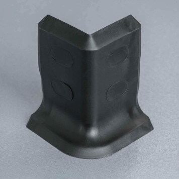 Angle externe noir pour plinthe PVC à lèvres souples avec bouchons insérés
