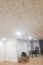 faux plafond dans un hôtel avec dalles ombelle dune